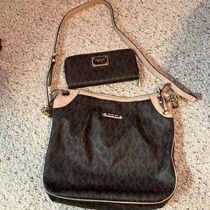 Michael Kors purse and matching wallet.